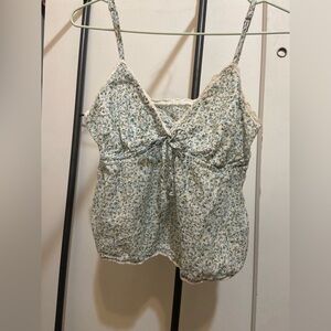 Super cute floral summer tank top with some lace on the outside
